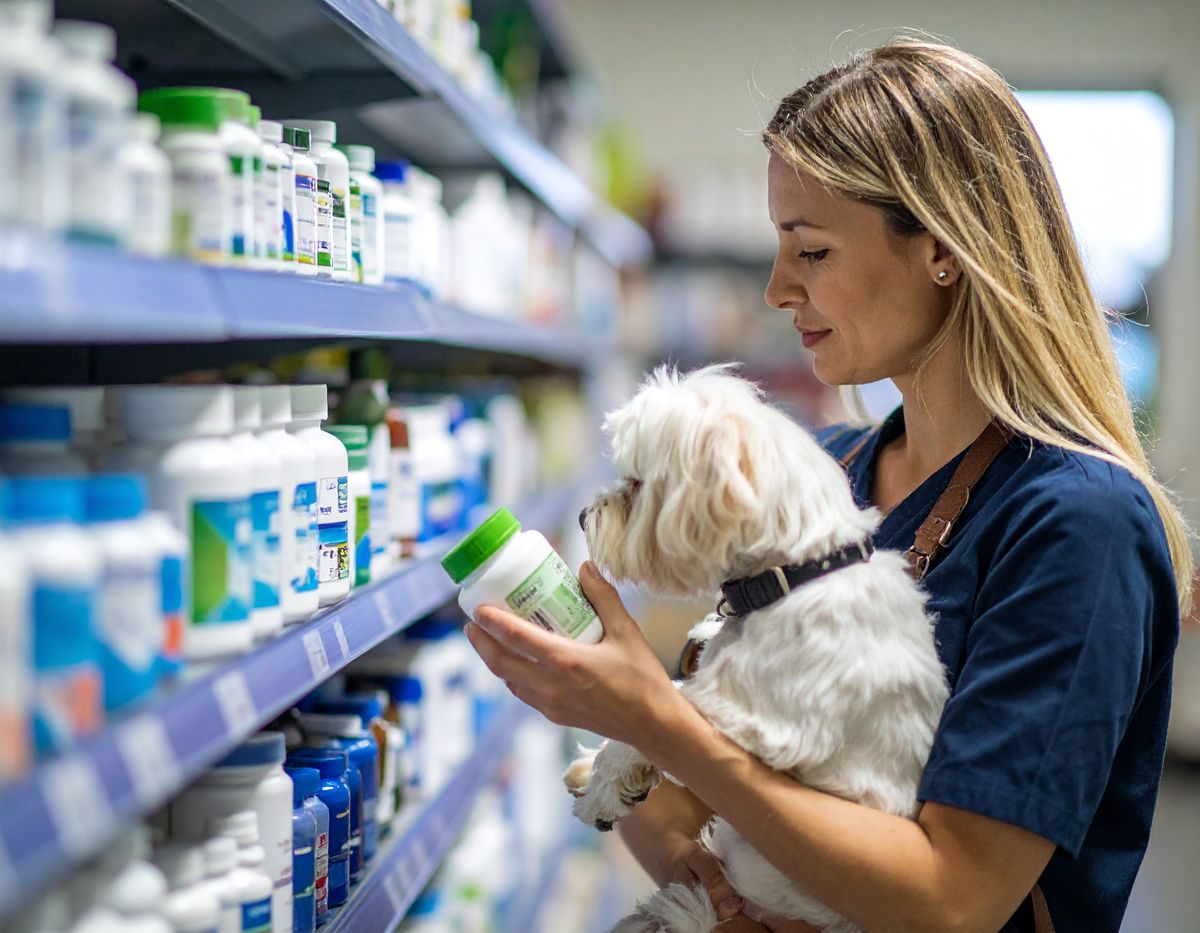 Vet explaining medicine to a pet owner at Vetnaria Pets Hospital